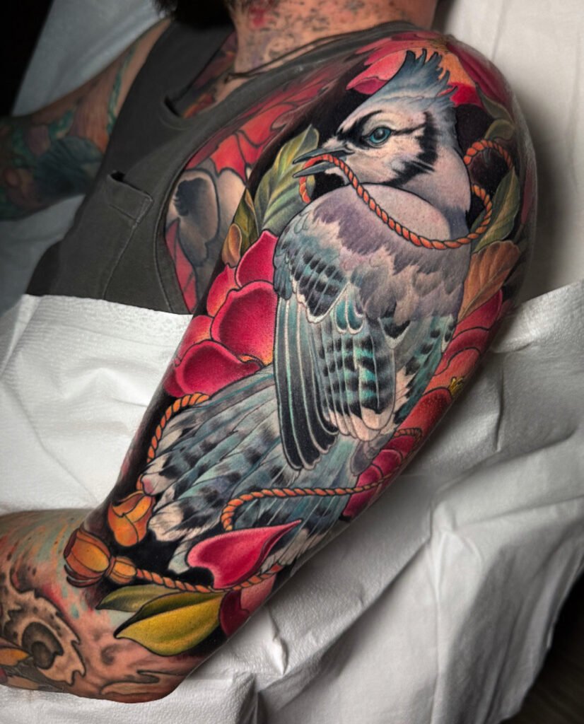 Blue jay tattoo,black sage laser tattoo removal cover up tattoo, arm sleeve tattoo, Colorado tattoo artist, melis fusco art, tattoo art, Neo traditional tattoo art, realistic Neo trad 