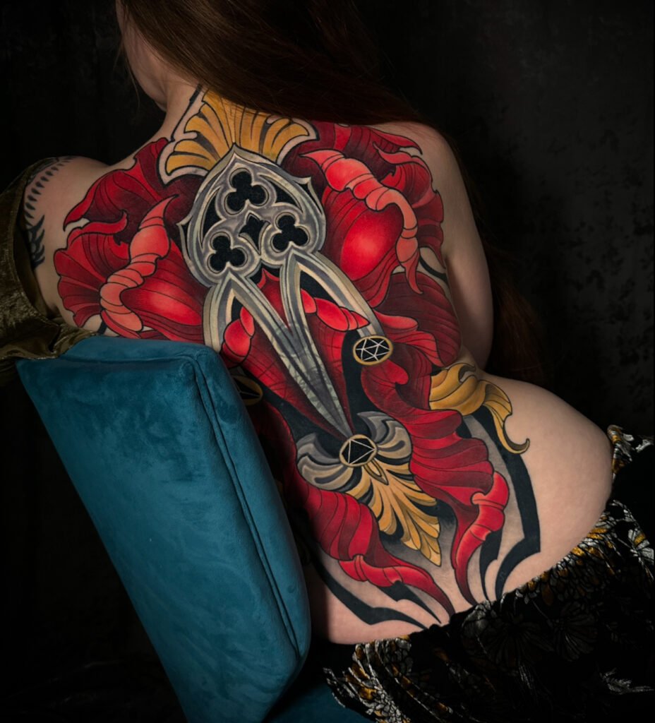 Realistic full color tattoo,  tattoo artist in evergreen Colorado, best color tattoo artist Colorado, color tattoo artist Evergreen Colorado, award winning artist Colorado, Cover up tattoo laser tattoo removal, black sage laser tattoo removal, back piece large color flower, gothic archetype tattoo