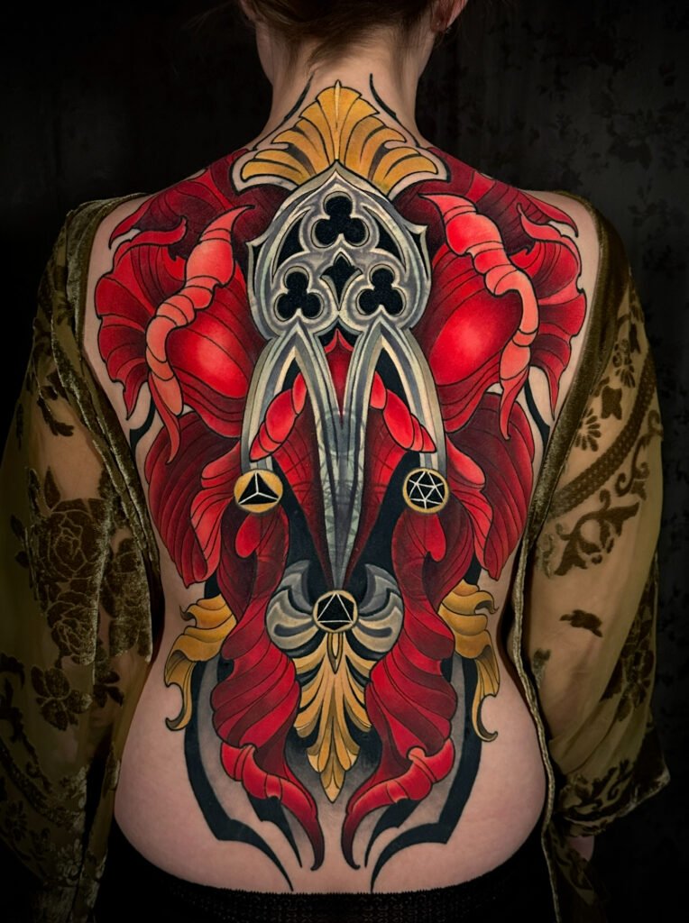 Realistic full color tattoo,  tattoo artist in evergreen Colorado, best color tattoo artist Colorado, color tattoo artist Evergreen Colorado, award winning artist Colorado, Cover up tattoo laser tattoo removal, black sage laser tattoo removal, back piece large color flower, gothic archetype tattoo