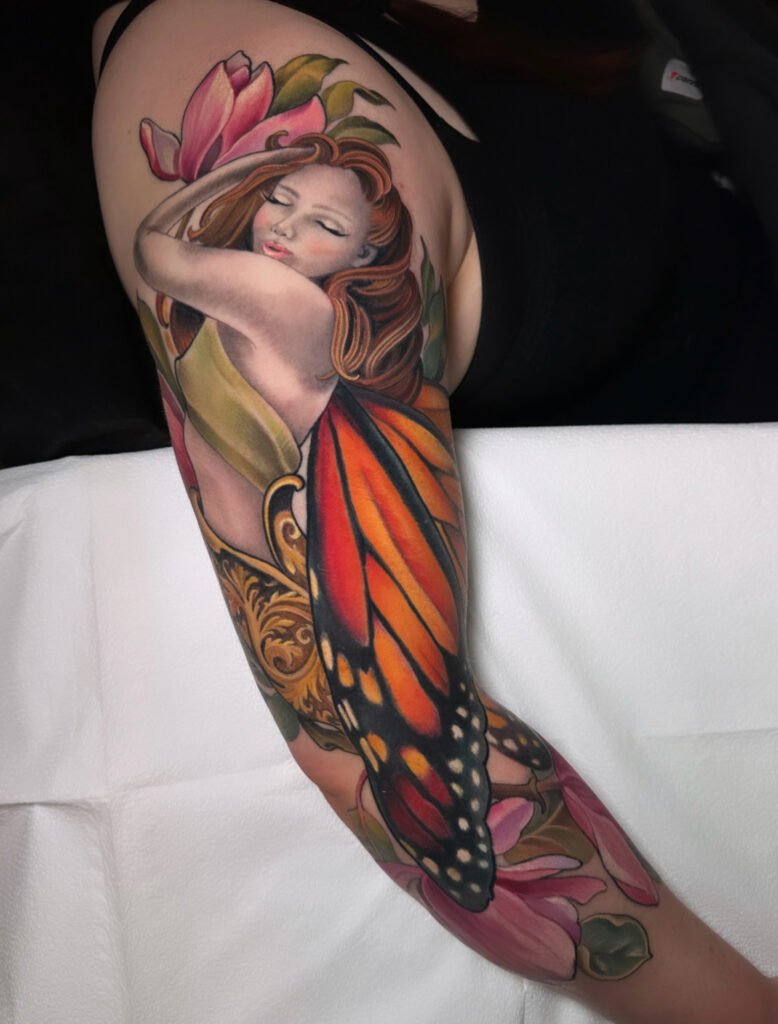 Monarch butterfly tattoo, lady monarch butterfly tattoo, Realistic full color tattoo,  tattoo artist in evergreen Colorado, best color tattoo artist Colorado, color tattoo artist Evergreen Colorado, award winning artist Colorado, melis fusco tattoo artist 